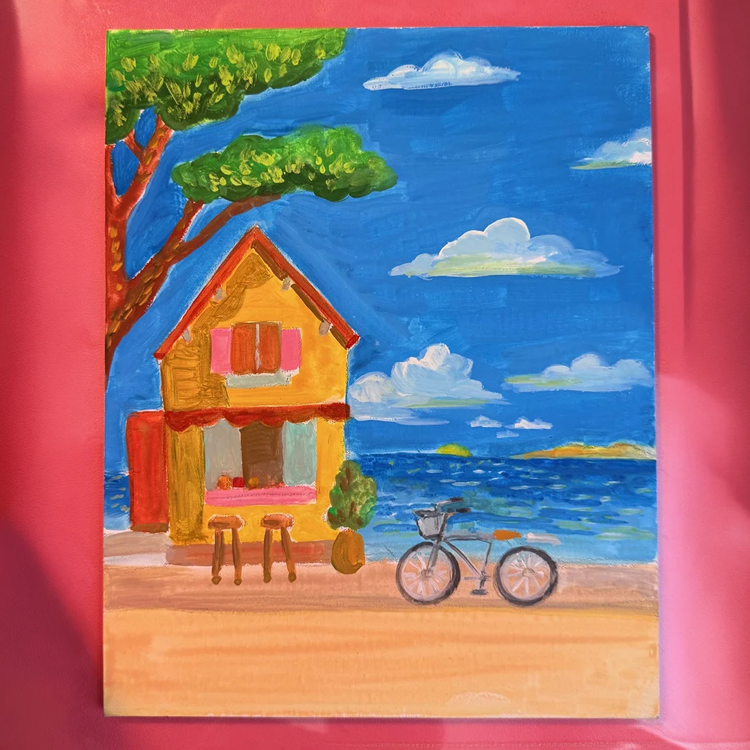 Colorful seaside cafe with bicycle